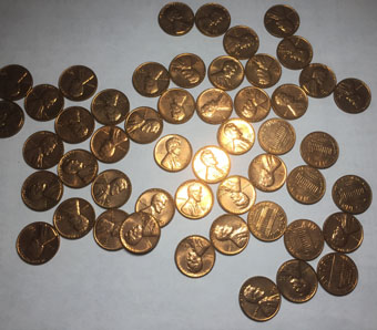 Coin-Rolling-Hunting-Find.-21-Rolls-Of-1963-D-Uncirculated-Pennies